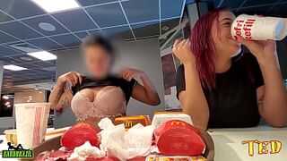 Two naughty girls making out with their breasts out while eating at McDonald's - Official Tattooed Angel