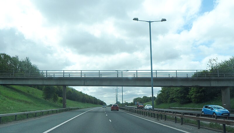 File:Track crosses the M66 - geograph.org.uk - 3497698.jpg