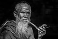 Man smoking (old age. behavior: drug use)