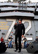 US Navy 021126-N-6817C-003 Wayne Newton entertains the officers and crew aboard Abraham Lincoln.jpg