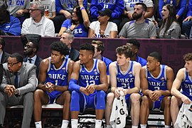 Duke players on bench.jpg