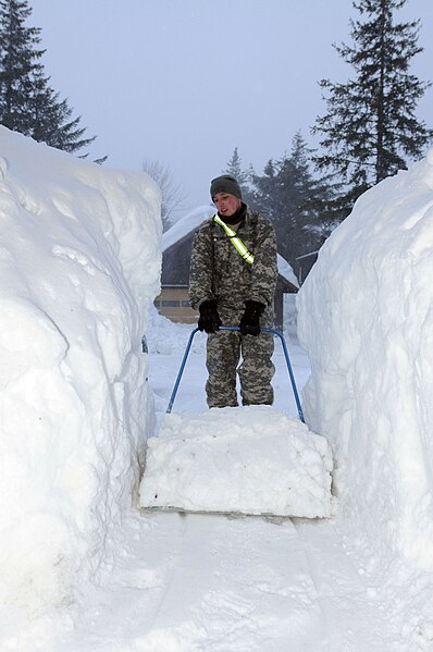 File:An Alaska National Guardsmen clears snow in Cordova (6690820563).jpg