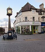 Town centre clock tower and Barnardo's charity shop, Colwyn Bay - geograph.org.uk - 4841335.jpg