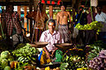 Sri Lankan middle aged street merchant (waist up outdoor portrait). Sri Lanka