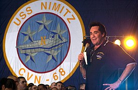 US Navy 030619-N-9319H-005 Actor-Entertainer Wayne Newton performs on stage during a United Services Organization (USO) show aboard USS Nimitz (CVN 68).jpg