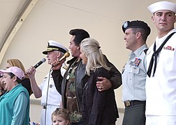 US Navy 050529-N-1854W-170 Commander, Navy Region Mid Atlantic, Adm. Stephen A. Turrcotte, second from left, joins musician-actor Wayne Newton for the closing song of the USO sponsored performance Patriotic Festival.jpg