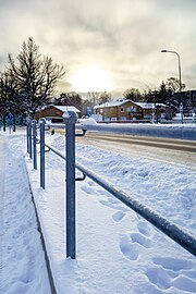 Snow at the bus stop in Brastad
