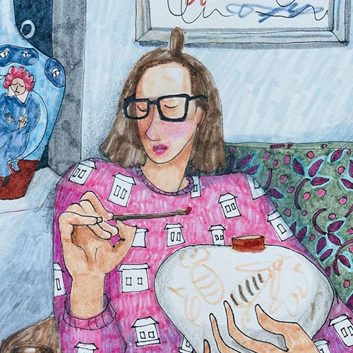 illustrated portrait of Evgenia. She has fair skin and short, straight, brown hair and is wearing black framed glasses. Her eyes are closed and she is wearing a pink crew neck sweater with white houses on it. She is sitting on a purple and green chair and is holding a white ceramic vase in her left hand and a paintbrush with red paint on the tip in her right hand. There is a blue wall with part of a picture frame visible behind her.