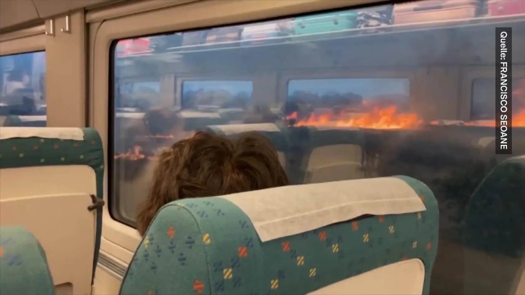 Spanien: Zug muss im Feuer stoppen