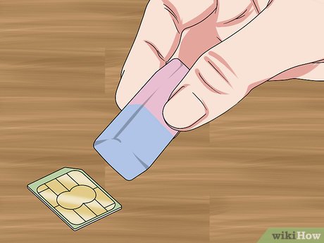 Step 1 Use an eraser or cotton swab to remove dirt or dust.