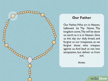 Step 2 With the large bead in hand, pray an Our Father.