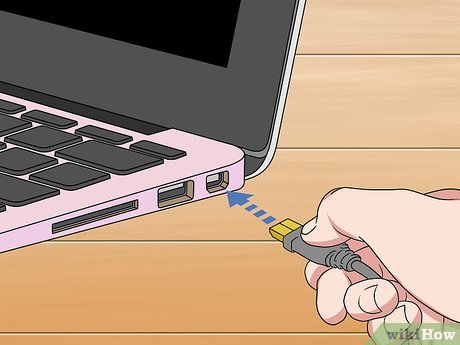 Step 6 Sambungkan kabel dari adaptor ke laptop.