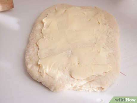 Step 2 Placez le beurre sur la pâte.