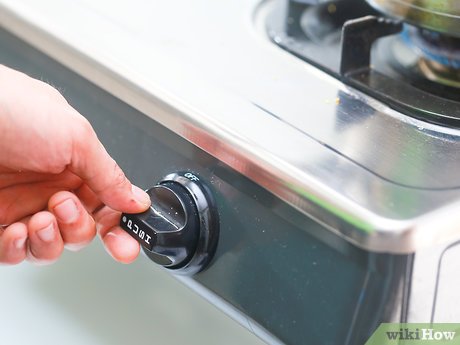 Step 5 Reduziere die Hitze auf mittelstarke Wärmezufuhr sobald das Wasser kocht.