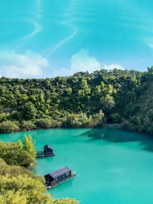 The turquoise lake less than an hour from London – with its own beach and Maldives-style overwater bungalows