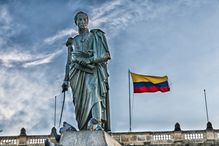 Simon Bolivar statue and Colombian flag