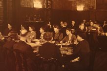 Residents of Hull House in the dining room, about 1920