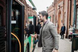 A man boarding a bus symbolizes the shared definition of the situation that shapes how we interact with others and what we do in a given situation.