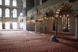 a man praying in the Sultan Ahmed mosque