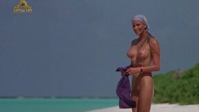 Satisfying Bo Derek showing off her unshaved twat at the beach
