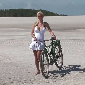 Passionate fucking on the beach with a stunning blonde with big tits