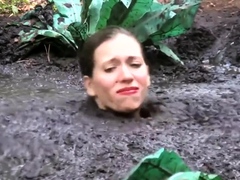 Busty Samantha gets very dirty outdoors in pool of mud