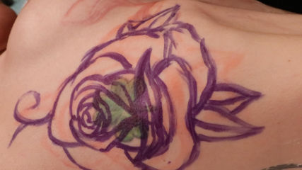 Marie Bossette Gets a Beautiful Rose Tattooed on Her Right Ribs