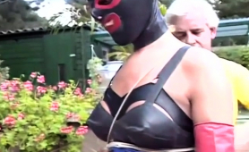 Masked slavegirl in the skillful hands of old bondage master