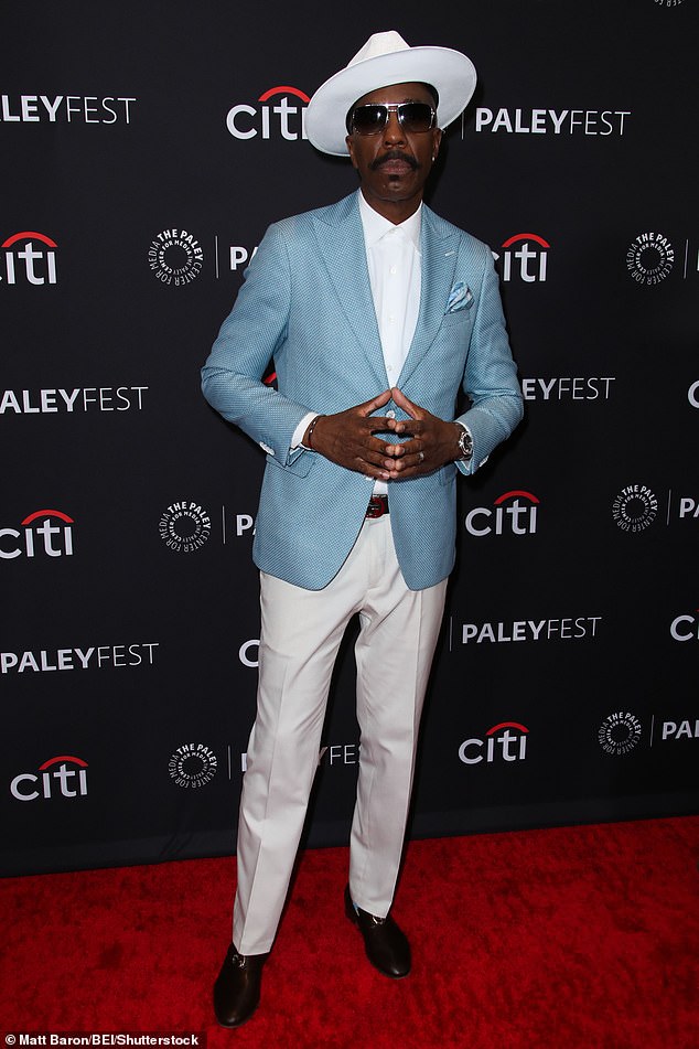 Comedian J.B. Smoove - who played Larry's eccentric roommate Leon Black - never removed his sunglasses while looking dapper in black Oxfords and a light-blue blazer over an all-white button-up shirt, pants, and hat