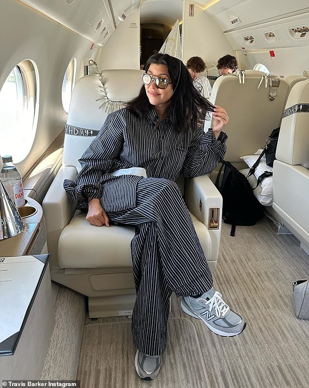 She lounged in pajamas aboard a private jet
