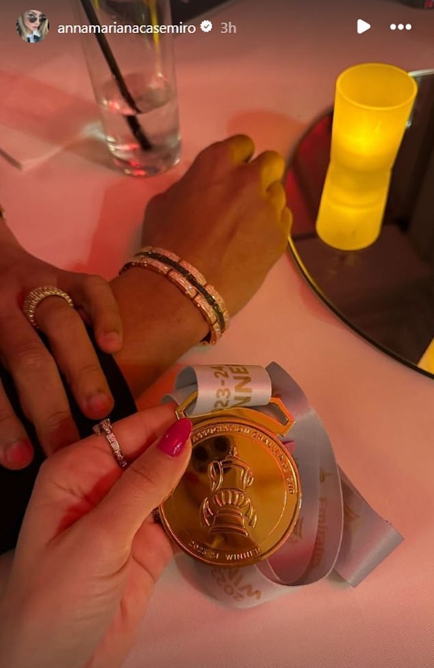 His wife Anna Mariana posted a photo of the Brazilian's medal while on their flight