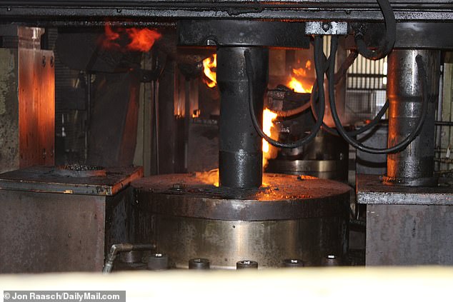 Several on-site presses begin to mold the molten steel into artillery-like steel tubes