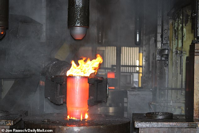 The billets are then handled by robots which begin to press the steel into shape