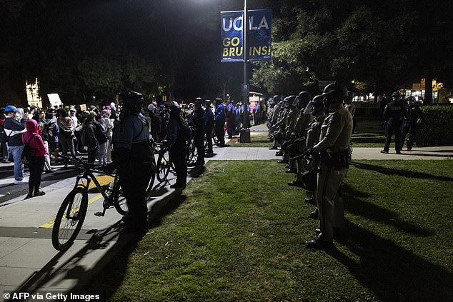 Two-dozen pro-Palestine protesters have been arrested in a day of chaos at UCLA where cops and students scuffled well into the night