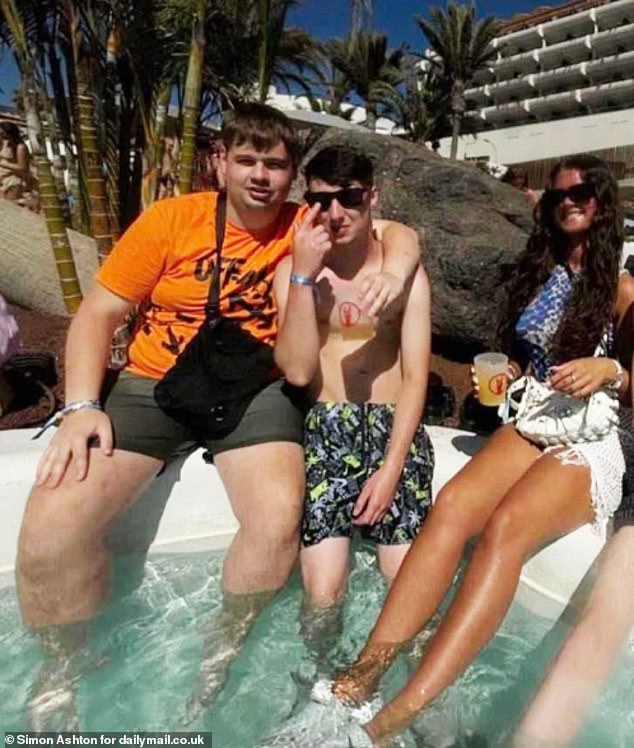 Earlier this week, MailOnline revealed pictures showing apprentice bricklayer Jay, 19, lounging by the pool of the Hard Rock Hotel in Playa de las Americas with dozens of other holidaymakers before he went missing. Pictured: With friends Brandon Hodgkin and Lucy Mae Law