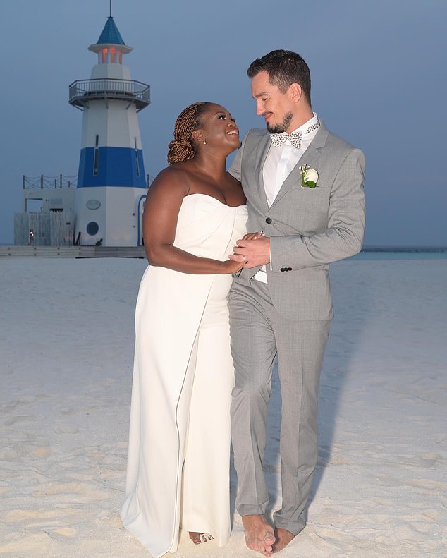 Strictly star Motsi Mabuse 's husband Evgenij Vozynuk is Ukrainian, and his parents have come to live with them in Germany as well as several refugees (pictured together)
