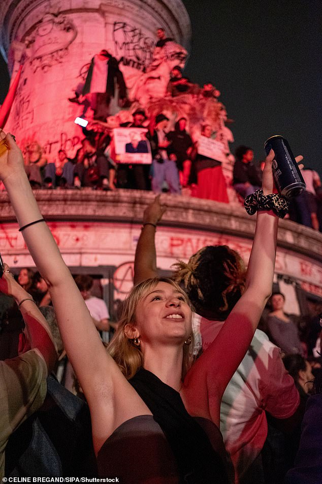 Young people shout slogans at the rally held after the results of the second round of the legislative elections were announced at Place de la Republique. Paris (France), July 7, 2024