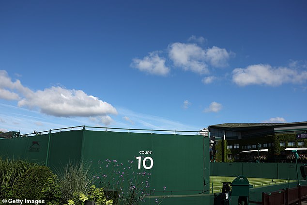 A general view of the outside of Court Ten as Centre court is pictured in the background today