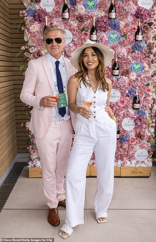 Myleene was in attendance with her fiancé Simon Motson who stood out in a light pink suit jacket and matching trousers