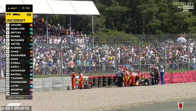 The race was red-flagged while Verstappen was taken away and the barrier damage was fixed