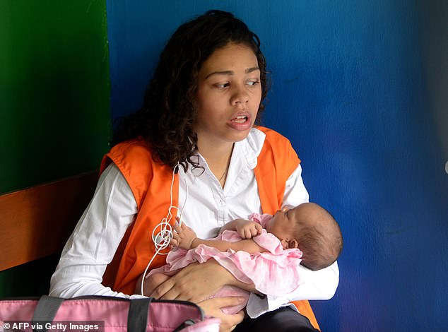 Earlier this month, Heather Mack, 27, pictured here with her prison-born child, announced that she was striking a deal with Illinois prosecutors