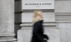 File photo of a pedestrian walking past the headquarters of Her Majesty's Revenue and Customs (HMRC) in central London<br>A pedestrian walks past the headquarters of Her Majesty's Revenue and Customs (HMRC) in central London, Britain in this February 13, 2015 file photo.  To match Insight UK-REGULATIONS/AGENTS   REUTERS/Stefan Wermuth/Files