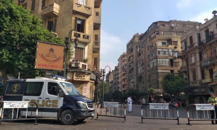 Security forces block a road leading to Tahrir Square