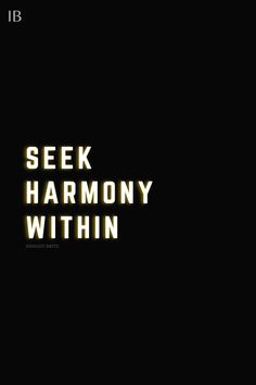 the words seek harmony within in yellow on a black background