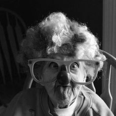 an old woman with glasses on her face