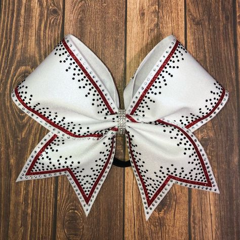 "Badda Bling Bows provides the highest quality bows on the market specializing in individual, practice and team bows and we uniform match, This bow is shown in white with red glitter but is abusing any color combination. - FREE SHIPPING on all team orders.. - Made with 3\" ribbon and premium nylon elastic hair bands that won't damage hair as they have no metal parts and are seamless. - Packaged and shipped in a box to ensure it arrives in perfect condition. - All of our sublimated bows are print Rhinestone Cheer Bows, Cheer Competition Bows, Competition Cheer Bows, Sparkly Cheer Bows, Cheer Buckets, Cheer Decorations, Cheer Practice Wear, Cheer Games, Competition Bows