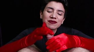 Klaarkomen op rode Opera-handschoenen