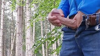 Horny in the forest while hiking and jerking off my hard cock in the rain - Part 1