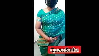 Fantasia de papel sobre uma tamil Amma vestindo sari verde e confortando seu enteado