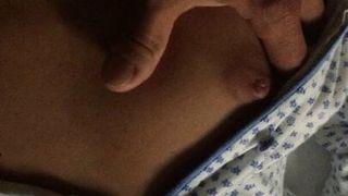 Stroking and stripping wife while she's on bed, showing tits